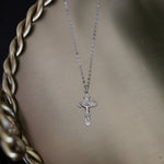 Silver vintage crucifix necklace with a detailed corpus