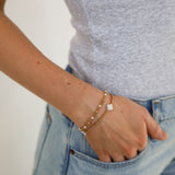 Model two bracelets pearl and gold
