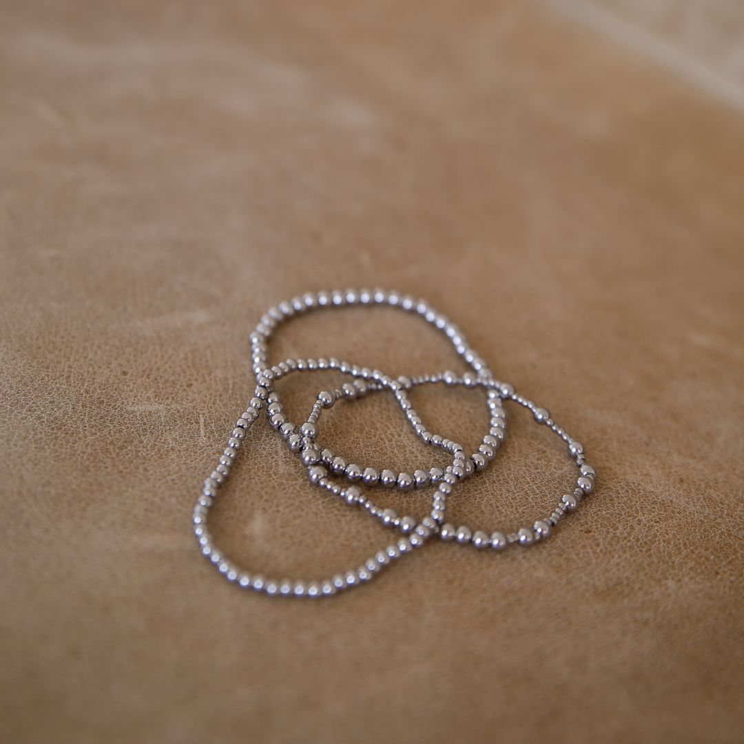 Stack of 3 silver bracelets