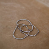 Stack of 3 silver bracelets