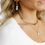 Model layering necklaces