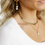 Model layering necklaces