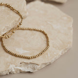 Plain gold beaded bracelet