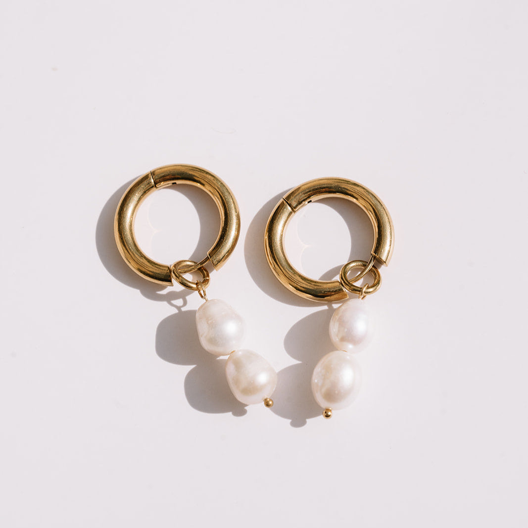 Pearl gold hoops white background
