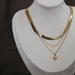 necklaces styled on mannequin