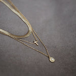 Necklaces laid with black background