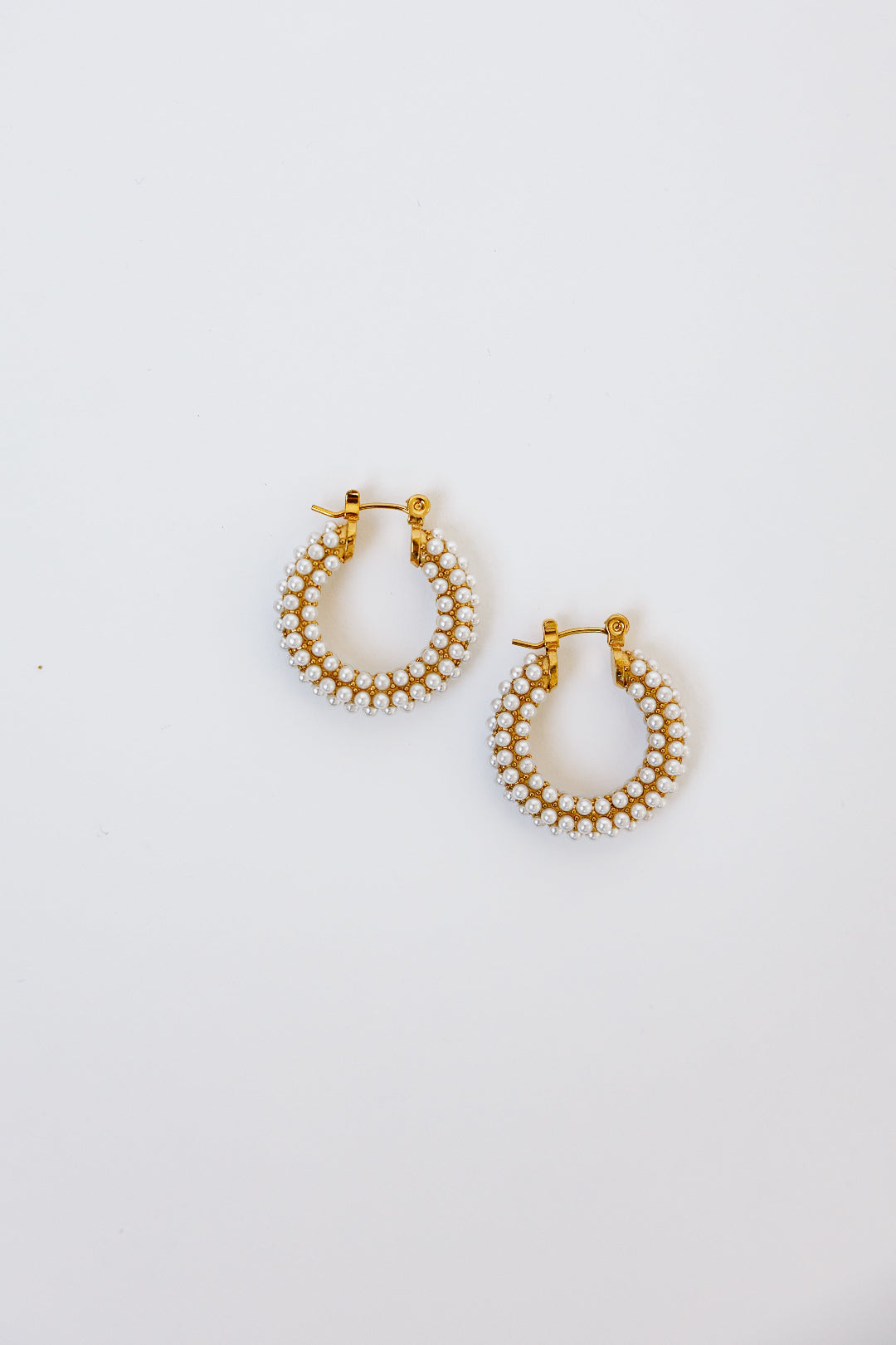 Pearl hoops with white background
