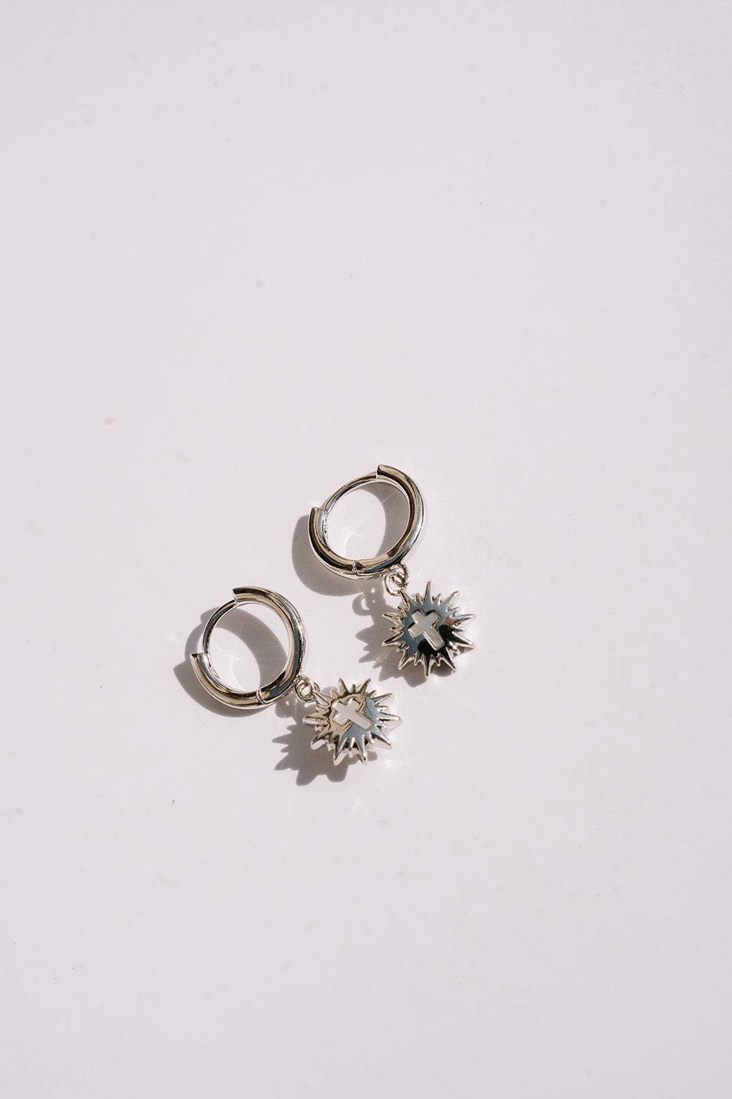 Silver huggies white background