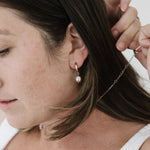 Modeled silver monstrance earrings