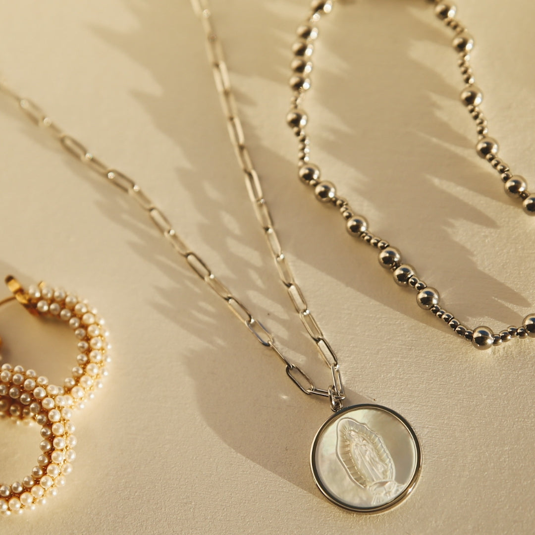 Zoomed in silver mother mary