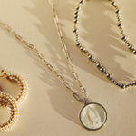 Zoomed in silver mother mary