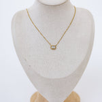 Zoomed out mannequin crystal necklace