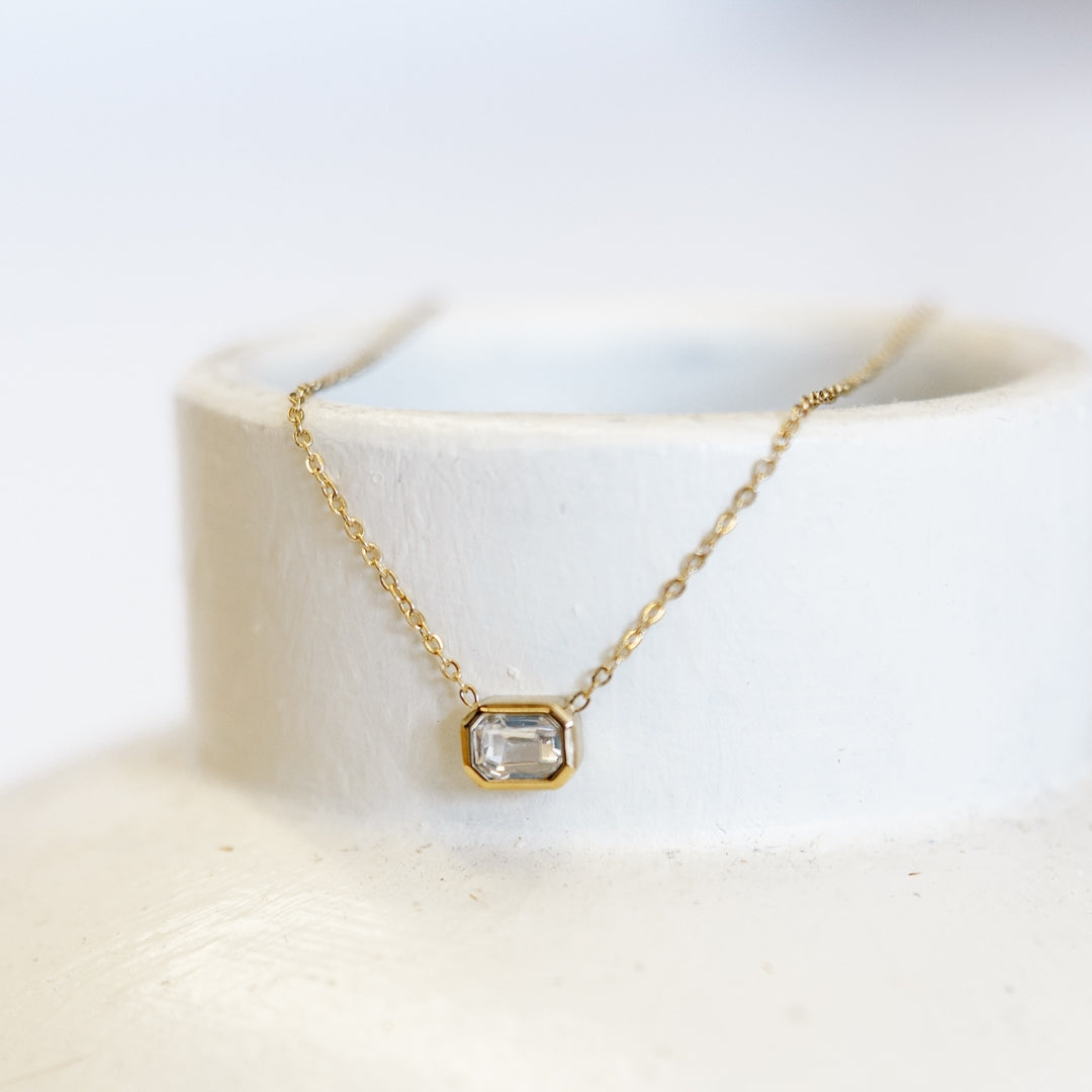 Close up of Sophia necklace on vase