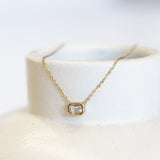 Close up of Sophia necklace on vase