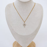 Full mannequin displaying cross necklace