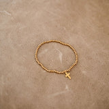 Gold cross bracelet
