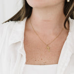 Crucifix necklace modeled
