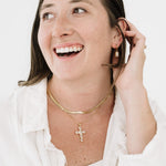 Model crystal cross and slink in gold