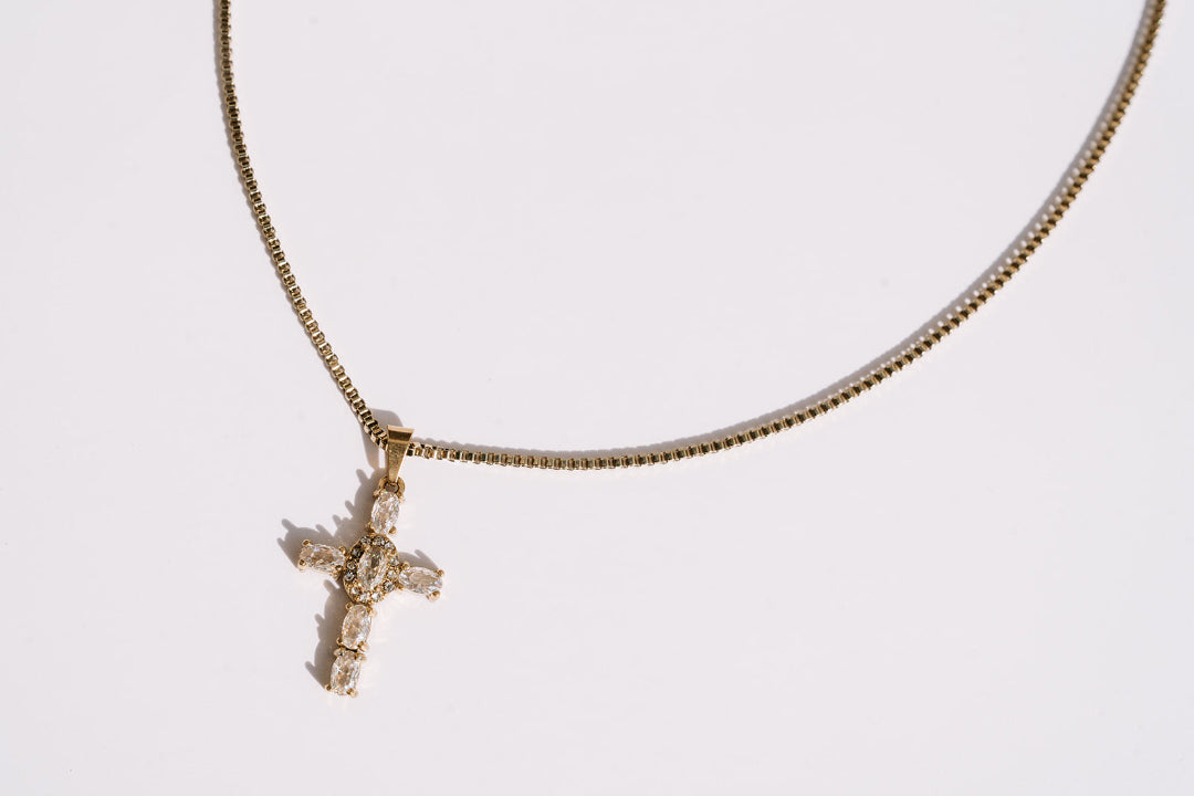 Close up crystal cross white background