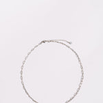 Zoomed out silver necklace white background