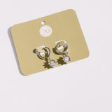 Monstrance Pearl Huggie Earrings